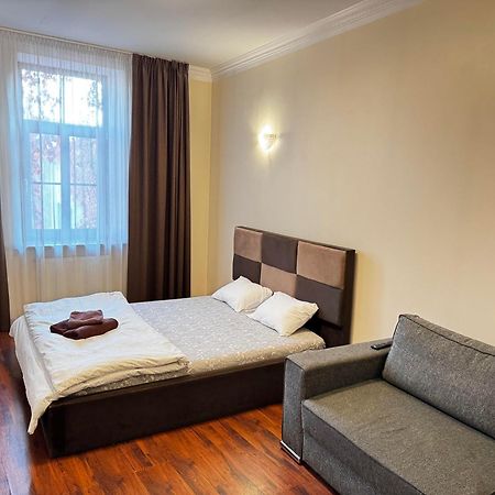 Aparthotel Рига Экстерьер фото A bedroom in a hotel