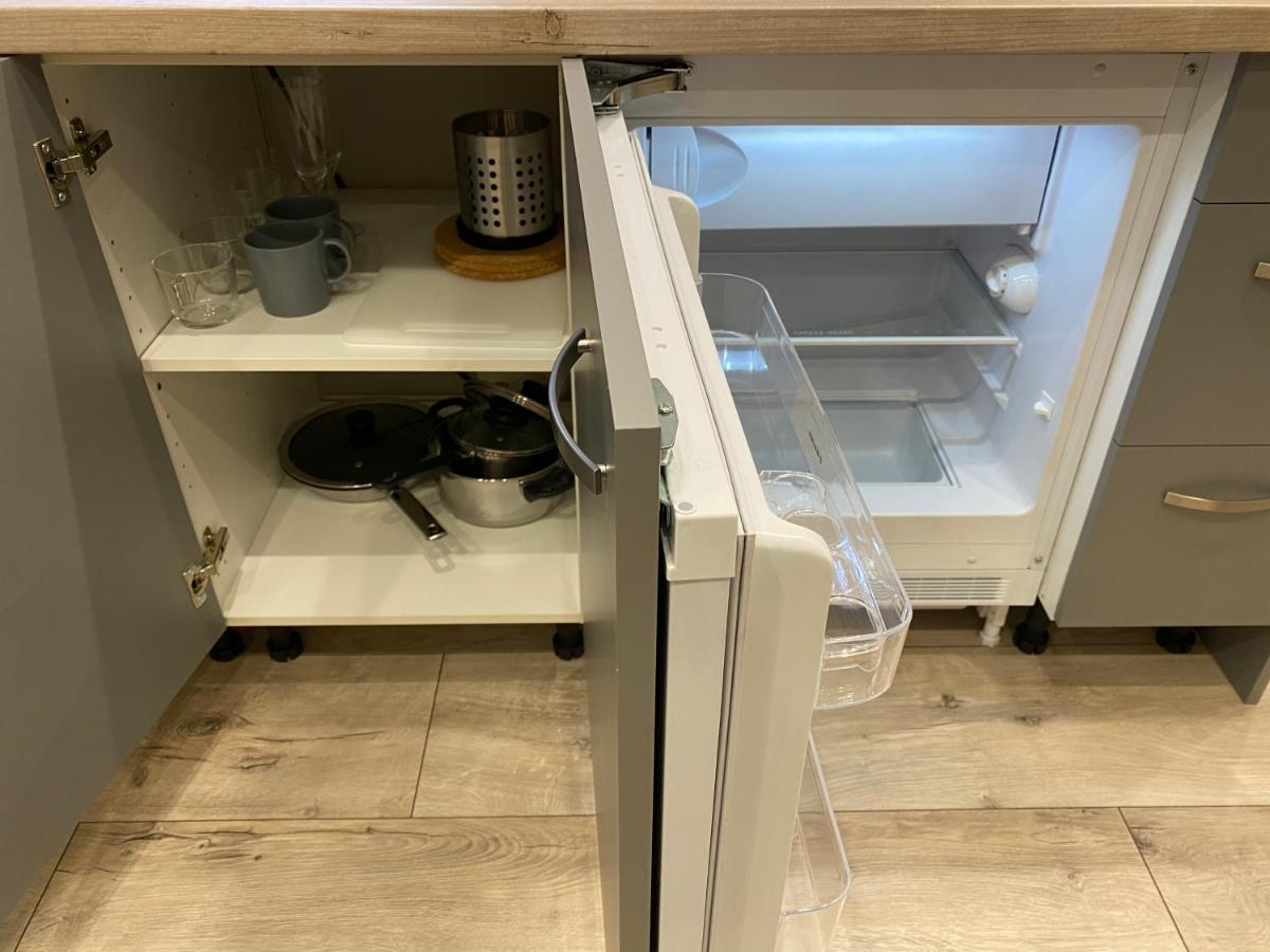 Aparthotel Рига Экстерьер фото A refrigerator with a built-in ice maker