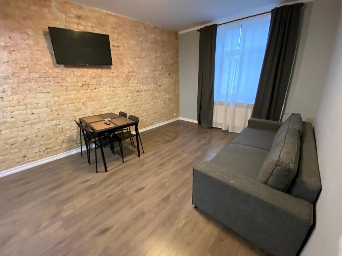 Aparthotel Рига Экстерьер фото A living room in a typical apartment