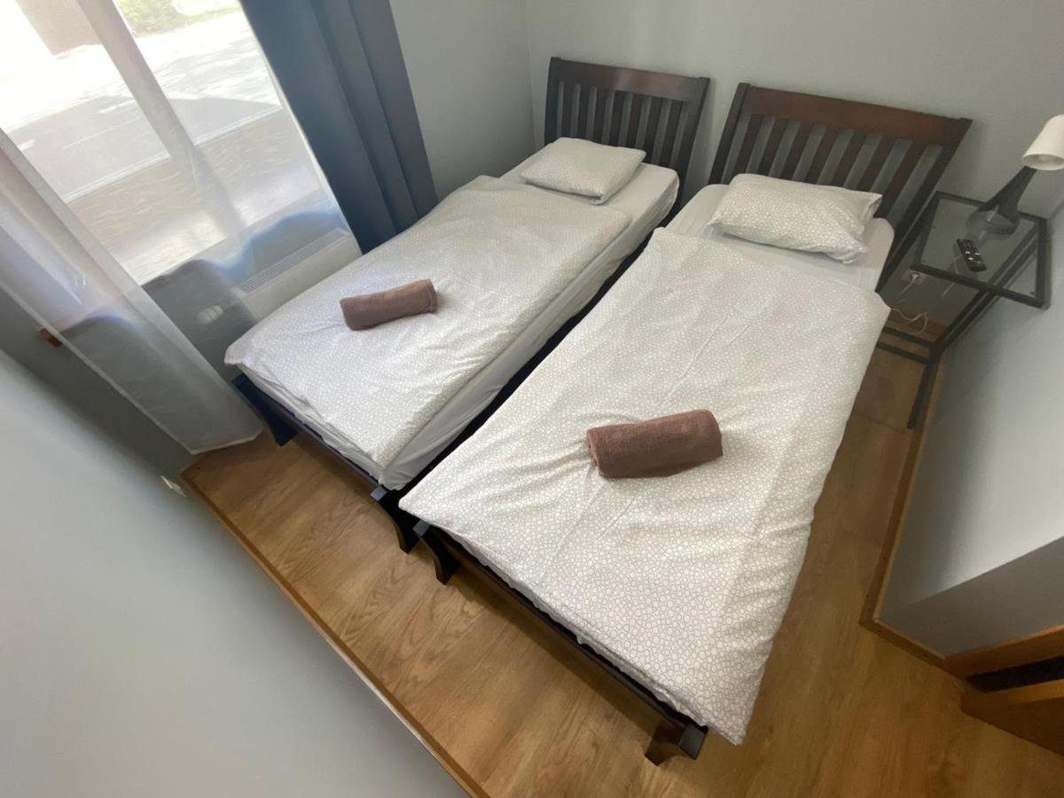 Aparthotel Рига Экстерьер фото Two single beds