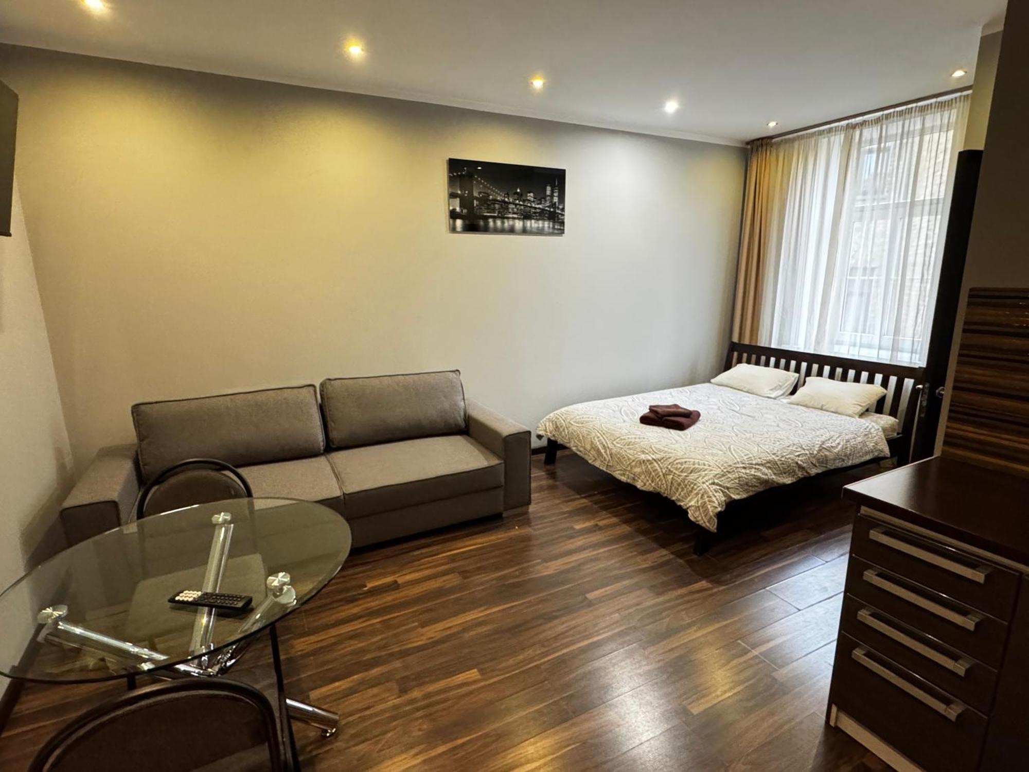 Aparthotel Рига Экстерьер фото A studio apartment in London