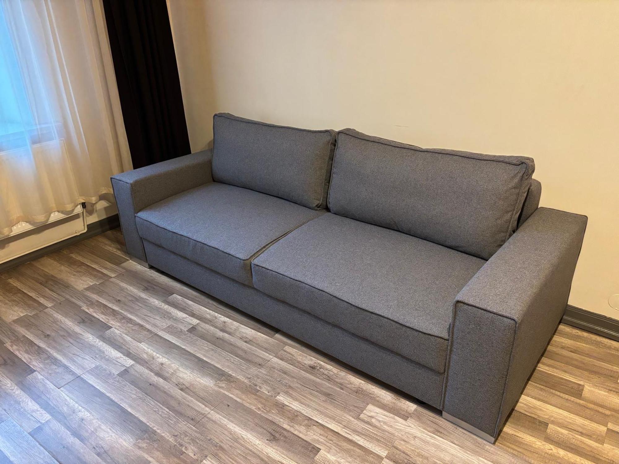 Aparthotel Рига Экстерьер фото A sofa